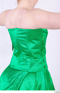  Photos Woman in Ceremonial 20th century Dress 20th century green dress upper body 0002.jpg